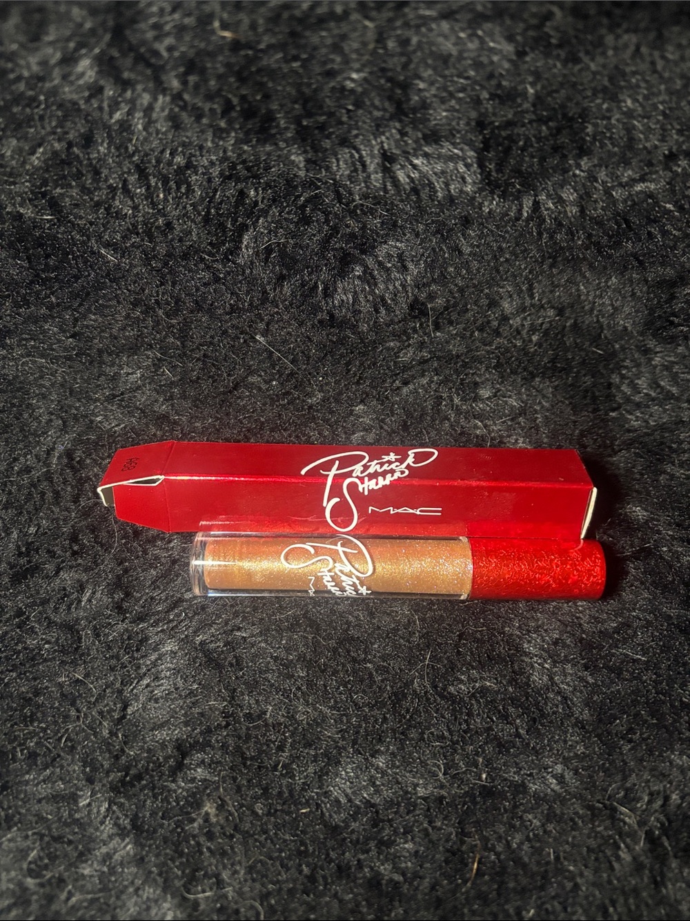 MAC Patrick Starrr Lipglass - Twerk for Gifts 
Brand new